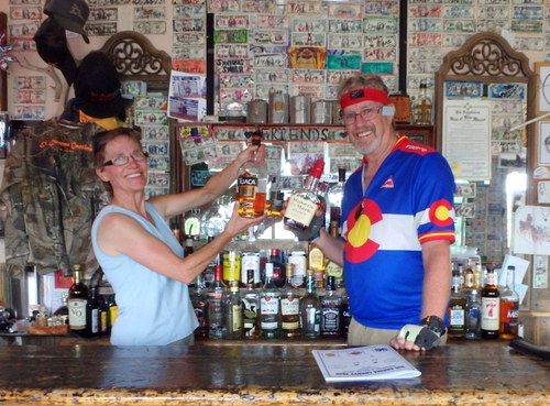 GDMBR: Terry abd Dennis Struck pose with Tuaca and Makers Mark at the Cebolla, NM, Country Bar.